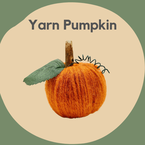 A small pumpkin made out of yarn