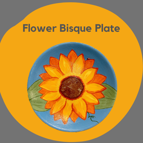 a flower painted on a bisque plate