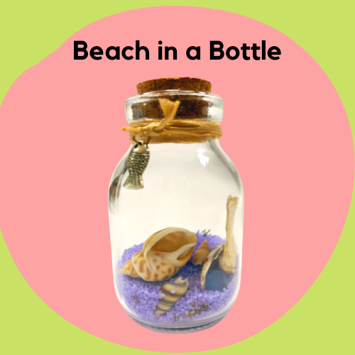 A small bottle with sand and beach items.
