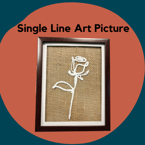 A picture frame with a single line drawing on the front.